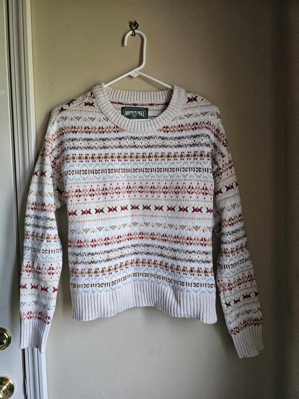 American Eagle Outfitters Cream Crewneck Sweater with Red and Tan Pattern